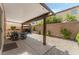 Backyard featuring a covered patio, furniture, and landscaping at 2765 Rochester Run Ave, Henderson, NV 89052