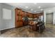 A spacious kitchen features granite countertops, tile floor, and breakfast bar seating at 2765 Rochester Run Ave, Henderson, NV 89052