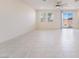 Bright living room features tile floors and natural light at 2910 Ventana Ridge Ave, Henderson, NV 89044