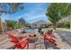 Inviting backyard featuring a fire pit, ample seating, and manicured landscaping at 344 E Rush Ave, Las Vegas, NV 89183