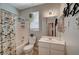 Cozy full bathroom with shower-tub combination and colorful shower curtain at 344 E Rush Ave, Las Vegas, NV 89183