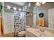 Bright bathroom with natural light, shower-tub combination, and neutral tones at 344 E Rush Ave, Las Vegas, NV 89183