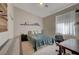 Bright bedroom with vaulted ceiling and neutral tones at 344 E Rush Ave, Las Vegas, NV 89183
