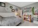 Comfortable bedroom with soft gray walls, white wainscoting, and stylish decor at 344 E Rush Ave, Las Vegas, NV 89183