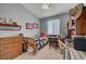 Cozy bedroom with closet, dresser, and work desk at 344 E Rush Ave, Las Vegas, NV 89183