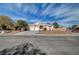 Charming single-story home with a well-maintained lawn and a spacious three-car garage at 344 E Rush Ave, Las Vegas, NV 89183