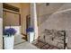 Welcoming entryway featuring potted flowers and a bench, ideal for enjoying the outdoors at 344 E Rush Ave, Las Vegas, NV 89183