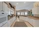 Open kitchen featuring granite countertops, stainless appliances, and easy flow to the dining and living areas at 344 E Rush Ave, Las Vegas, NV 89183