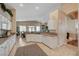 Stylish kitchen with granite countertops, stainless steel appliances, and adjacent dining area for easy entertaining at 344 E Rush Ave, Las Vegas, NV 89183