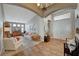Bright living room with hardwood floors and ample natural light, creating a warm and inviting atmosphere at 344 E Rush Ave, Las Vegas, NV 89183