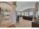 Open-concept living space includes a kitchen, dining, and living area with tile flooring at 344 E Rush Ave, Las Vegas, NV 89183