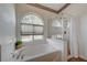 Bright bathroom with a shower and soaking tub at 344 E Rush Ave, Las Vegas, NV 89183