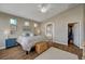 Spacious main bedroom featuring hardwood floors, ensuite bathroom, and walk-in closet at 344 E Rush Ave, Las Vegas, NV 89183