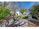 Cozy backyard patio featuring outdoor seating and an elegant brick trim at 344 E Rush Ave, Las Vegas, NV 89183