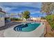 Private backyard pool with plenty of outdoor seating and mature trees at 344 E Rush Ave, Las Vegas, NV 89183