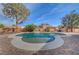 Gorgeous backyard pool with trees and an elegant brick trim at 344 E Rush Ave, Las Vegas, NV 89183