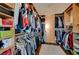 Organized walk-in closet with ample shelving and hanging space at 344 E Rush Ave, Las Vegas, NV 89183
