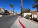Entrance to the Shadow Wood Condominiums community, surrounded by lush palm trees at 3682 Melonies Dr # 5, Las Vegas, NV 89103