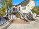 Exterior of building featuring covered stairwells and mature trees at 3682 Melonies Dr # 5, Las Vegas, NV 89103