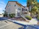 Exterior of building featuring covered stairwells, parking and mature trees at 3682 Melonies Dr # 5, Las Vegas, NV 89103