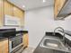 Kitchen features stainless steel appliances and stone countertops at 3682 Melonies Dr # 5, Las Vegas, NV 89103