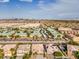 Suburban aerial view capturing homes, carports, and desert landscaping set against the skyline at 4664 Stuttgart St, Las Vegas, NV 89147