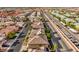 The aerial view shows residential homes in a planned community with desert landscaping at 4664 Stuttgart St, Las Vegas, NV 89147