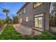 The backyard features a stone patio and well-maintained lawn at 4664 Stuttgart St, Las Vegas, NV 89147