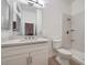 Clean bathroom featuring a vanity with solid surface counters and tiled shower stall at 4664 Stuttgart St, Las Vegas, NV 89147