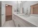 Bathroom featuring a double sink vanity with a marble countertop at 4664 Stuttgart St, Las Vegas, NV 89147