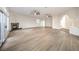 Vast living area showcasing an open layout, gas fireplace, and modern hardwood floors at 4664 Stuttgart St, Las Vegas, NV 89147