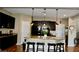 Kitchen with a large island and barstool seating at 5705 Petrified Tree Ln, North Las Vegas, NV 89081