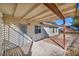 View of the covered patio and backyard with concrete and gravel at 5871 Mescal Way, Las Vegas, NV 89110