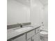 Bathroom features vanity with stone counter, sink, mirror and shower/tub combo at 6737 Violet Cascade Ave, Las Vegas, NV 89156