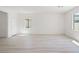 Bright and airy living room features tile floors and abundant natural light at 6737 Violet Cascade Ave, Las Vegas, NV 89156