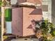 Birds-eye view of home featuring a well-maintained roof, backyard, and mature trees at 7021 Feather Pine St, Las Vegas, NV 89131