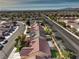 Aerial view of the homes showing street layout and landscaping within the residential area at 7021 Feather Pine St, Las Vegas, NV 89131