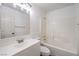 Bathroom featuring a bright vanity, mirror, and shower-tub combo at 7021 Feather Pine St, Las Vegas, NV 89131