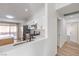 Bright kitchen featuring modern appliances, wood cabinets, white countertops and stainless steel appliances at 7021 Feather Pine St, Las Vegas, NV 89131