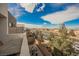 A lovely patio area and backyard can be seen from a balcony overlooking the property at 800 Loch Katrine Ave, Henderson, NV 89012