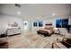 Spacious main bedroom with light wood floors, contemporary furnishings, and ample natural light at 800 Loch Katrine Ave, Henderson, NV 89012