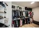 Walk-in closet with custom shelving and racks, offering ample space for clothes and accessories at 800 Loch Katrine Ave, Henderson, NV 89012
