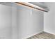 View of large closet with ample storage, a rod, and base molding at 808 N Torrey Pines Dr, Las Vegas, NV 89107