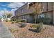 Charming townhouse with low-maintenance landscaping and sidewalk at 808 N Torrey Pines Dr, Las Vegas, NV 89107