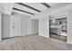 Open-concept living area, adjacent to the kitchen, features wood beam ceiling accents at 808 N Torrey Pines Dr, Las Vegas, NV 89107