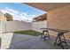 Covered patio space with work table and artificial grass for easy maintenance at 808 N Torrey Pines Dr, Las Vegas, NV 89107
