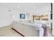 Bright living room showcasing an open floorplan with a fireplace and access to the kitchen at 8720 Castle View Ave, Las Vegas, NV 89129