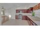 Cozy kitchen with stainless steel appliances and tile flooring at 9304 Cranesbill Ct, Las Vegas, NV 89149
