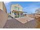 Spacious backyard with a covered patio and low-maintenance gravel landscaping at 9413 Aggie Ct, Las Vegas, NV 89148
