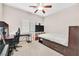 Bedroom with a desk, a fan and light fixture and a window at 9413 Aggie Ct, Las Vegas, NV 89148